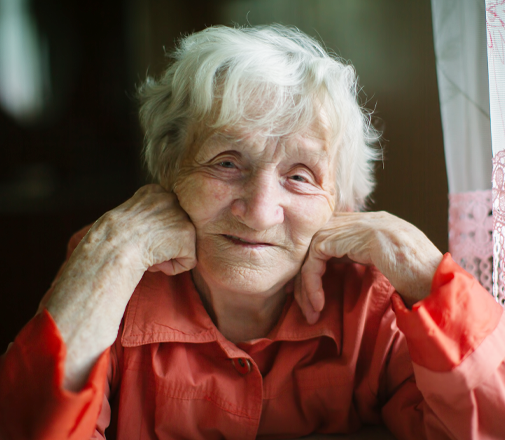 Woman With Hands to Her Face